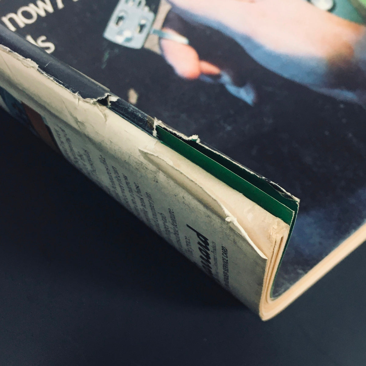 Spine view of VTG High Fidelity Magazine April 1975 highlighting wear on the binding and the magazine's vintage condition.