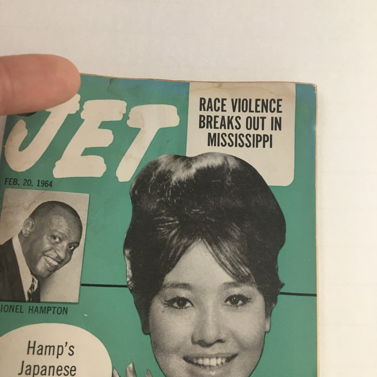 Close-up view of Jet Magazine February 20, 1964 cover highlighting Lionel Hampton and Miyoko Hoshino, with emphasis on the racial issues discussed.