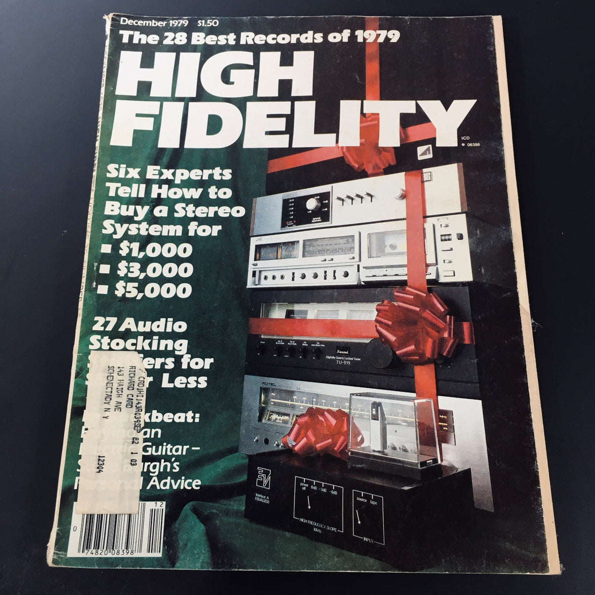 Cover of High Fidelity Magazine December 1979 featuring the title 'The 29 Best Records of 1979'. The magazine displays audio equipment with festive bows, highlighting expert advice on purchasing stereo systems.