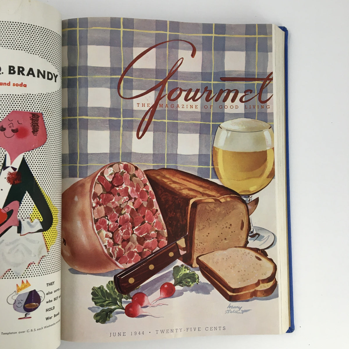 Cover illustration of Gourmet: The Magazine of Good Living, exhibiting a meat platter and a beverage alongside fresh vegetables from June 1944.