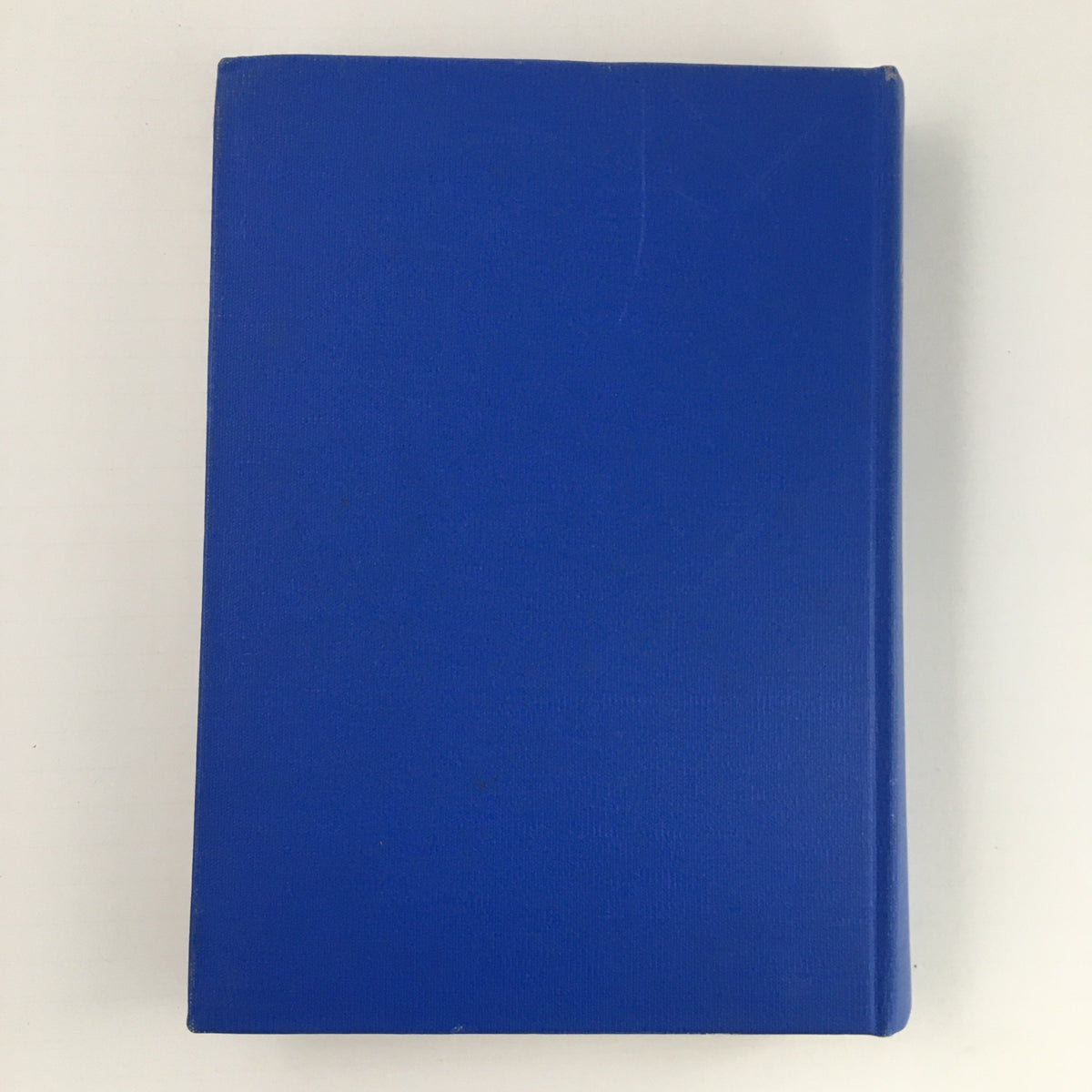 Back cover of Gourmet: The Magazine of Good Living Vol 4 (January to December 1944), showcasing a plain blue hardcover without any text or images. Perfect condition for vintage magazine preservation.