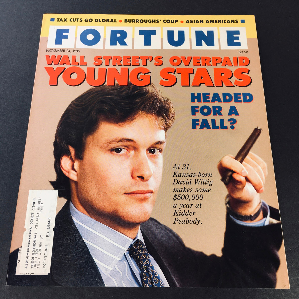 Cover of Fortune Magazine dated November 24, 1986 featuring David Wittig from Kidder Peabody, titled 'Wall Street's Overpaid Young Stars: Headed for a Fall?' showcasing a young businessman with a cigar.