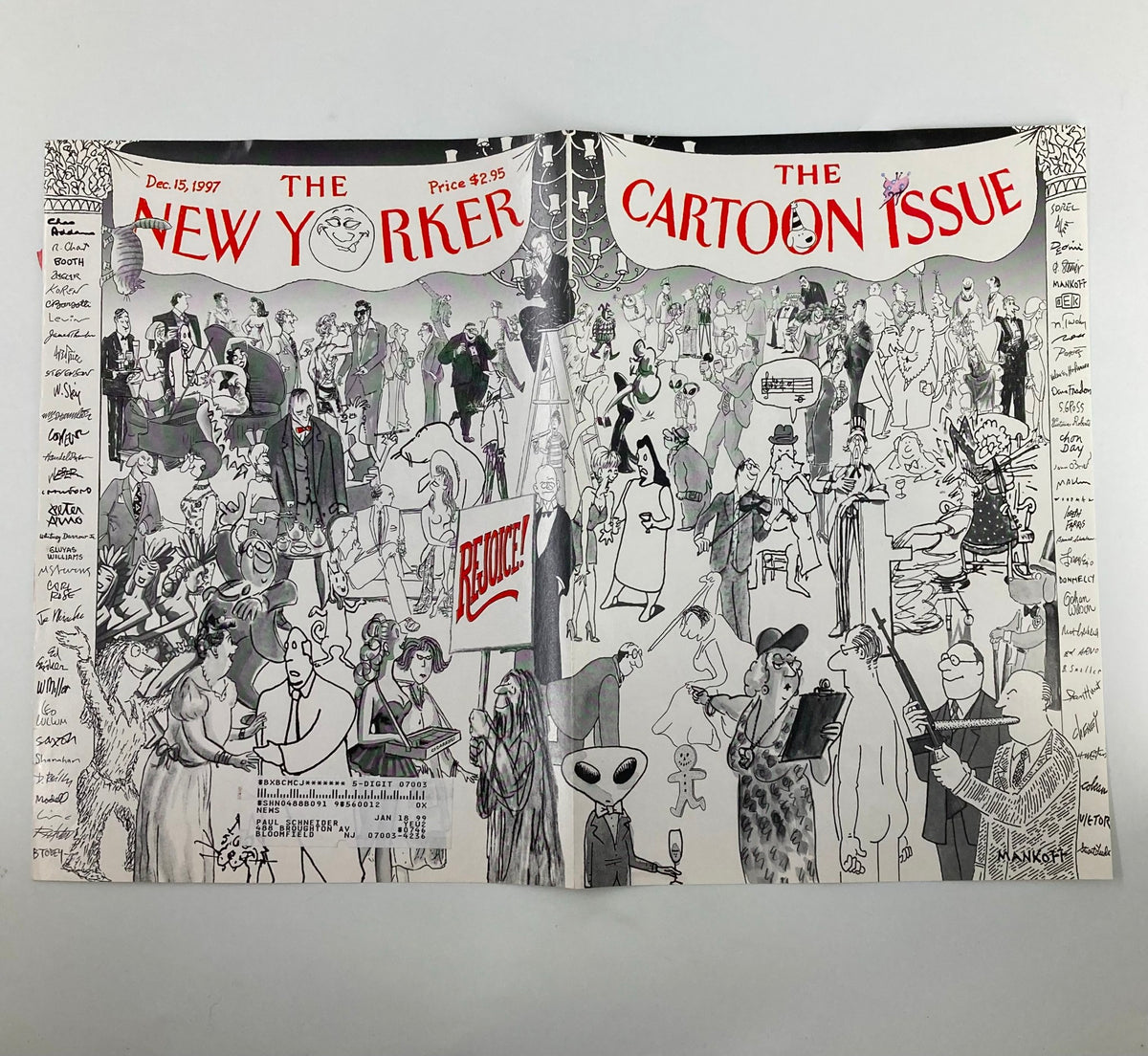 Inside view of The New Yorker December 15, 1997, titled 'The Gang's All Here' by Robert Mankoff, depicting various whimsical figures and a prominent 'Rejoice!' sign in a cartoonish, engaging manner.