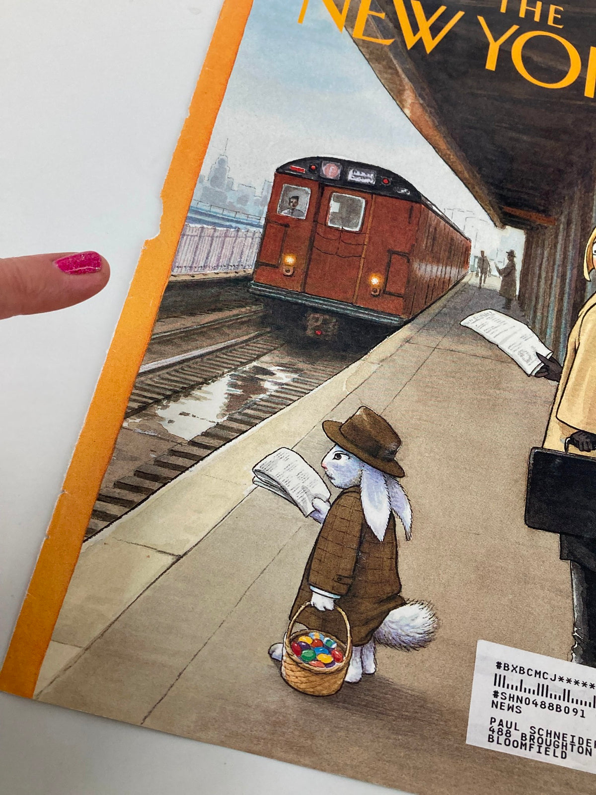Cover of The New Yorker dated April 13, 1998, featuring a whimsical illustration by Harry Bliss of a rabbit in a brown suit holding a basket of colorful eggs at a train station, representing the theme 'Another Day, Another Egg'.
