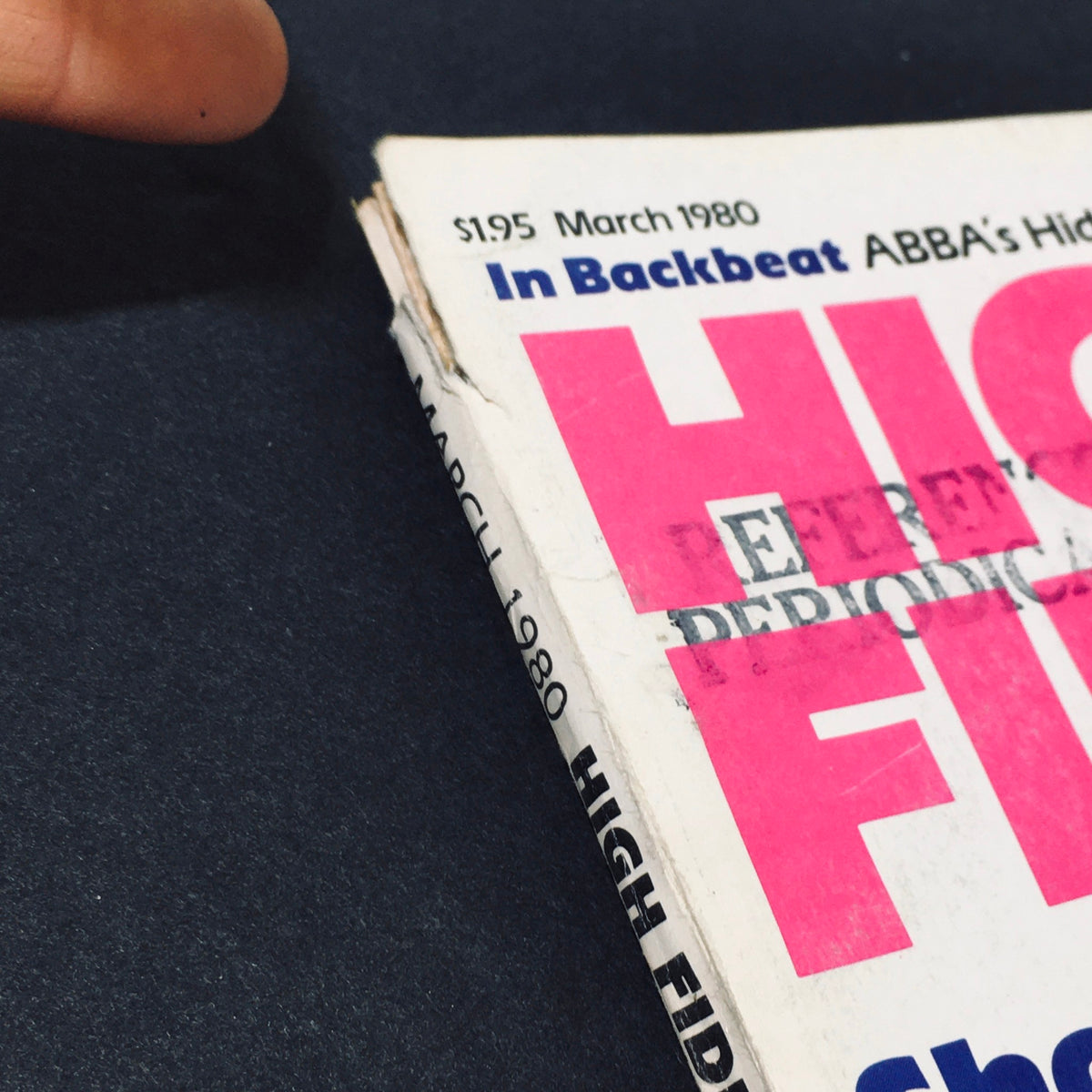 Close-up of the top corner of VTG High Fidelity Magazine March 1980 displaying the title and issue details, highlighting its vintage quality.