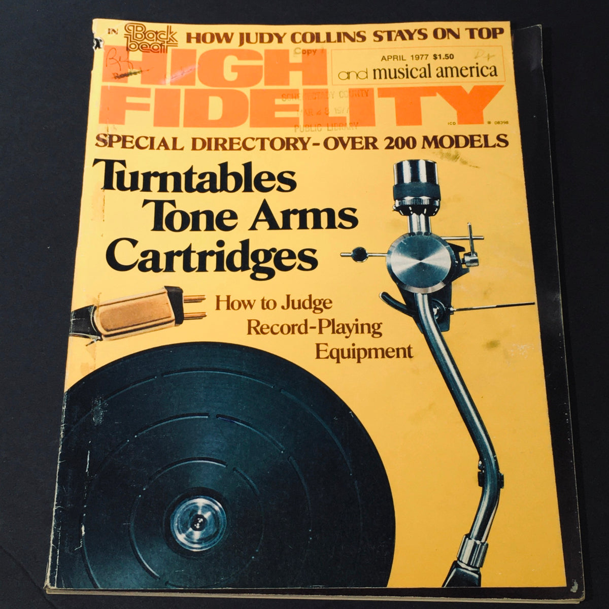 Vintage High Fidelity Magazine from April 1977 featuring turntables, tone arms, and cartridges on the cover.