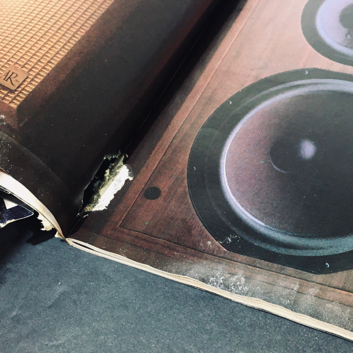 Image of damaged page in Stereo Review Magazine April 1986 depicting speaker equipment.