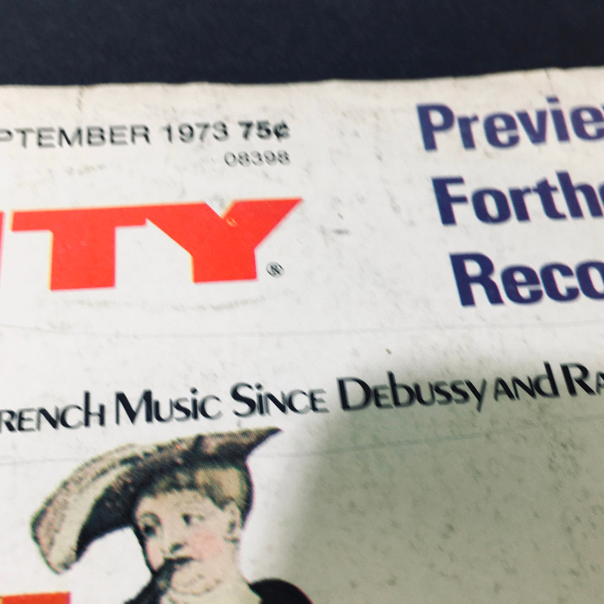 Detail shot of the High Fidelity Magazine September 1973 cover, showcasing the title and an illustration related to French music since Debussy.