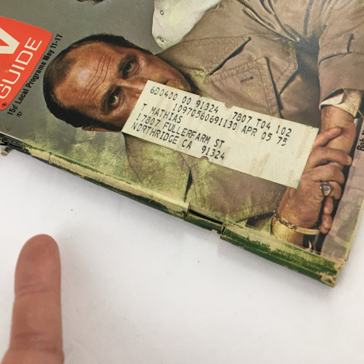 Close-up of the TV Guide Magazine May 11, 1974 cover featuring Bob Newhart and Peter Bonerz, highlighting a vintage address label on the front, adding character to this collectible.