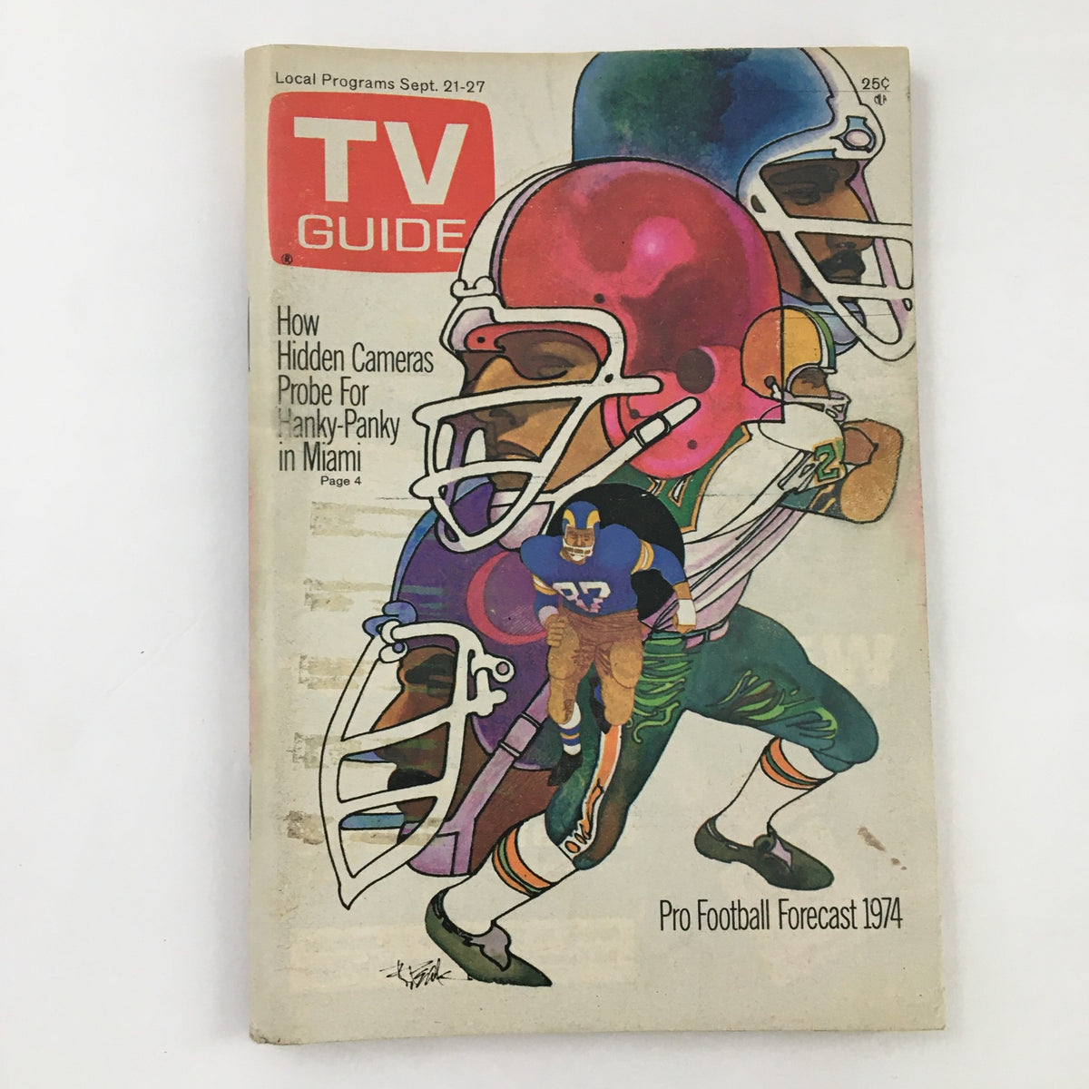 Cover of TV Guide Magazine September 21, 1974, featuring a colorful illustration of football players and the headline 'How Hidden Cameras Probe For Hanky-Panky in Miami'. This L.A. edition highlights significant 1970s pop culture phenomena.