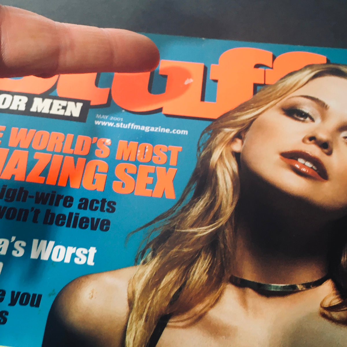 Close-up of Stuff For Men Magazine May 2001 highlighting Marisa Coughlan with the headline 'The World's Most Amazing Sex' under a finger pointing at the text.