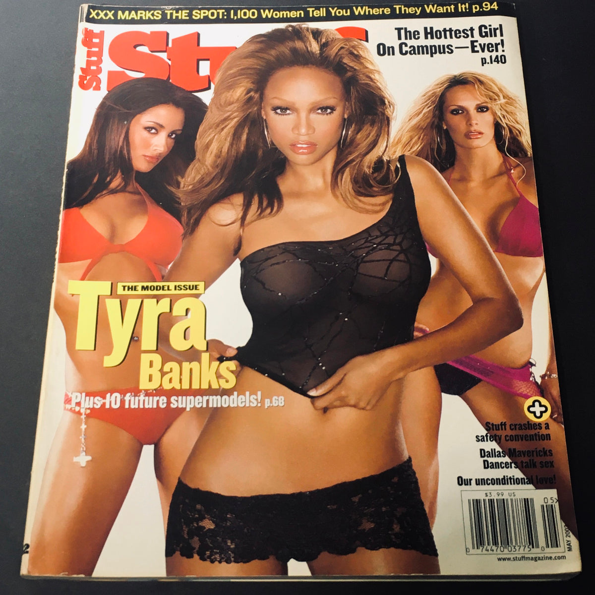 Stuff Magazine For Men May 2003 cover featuring Tyra Banks, Karen Cliche, and Barry Zito, showcasing supermodels in a vibrant, stylish presentation.