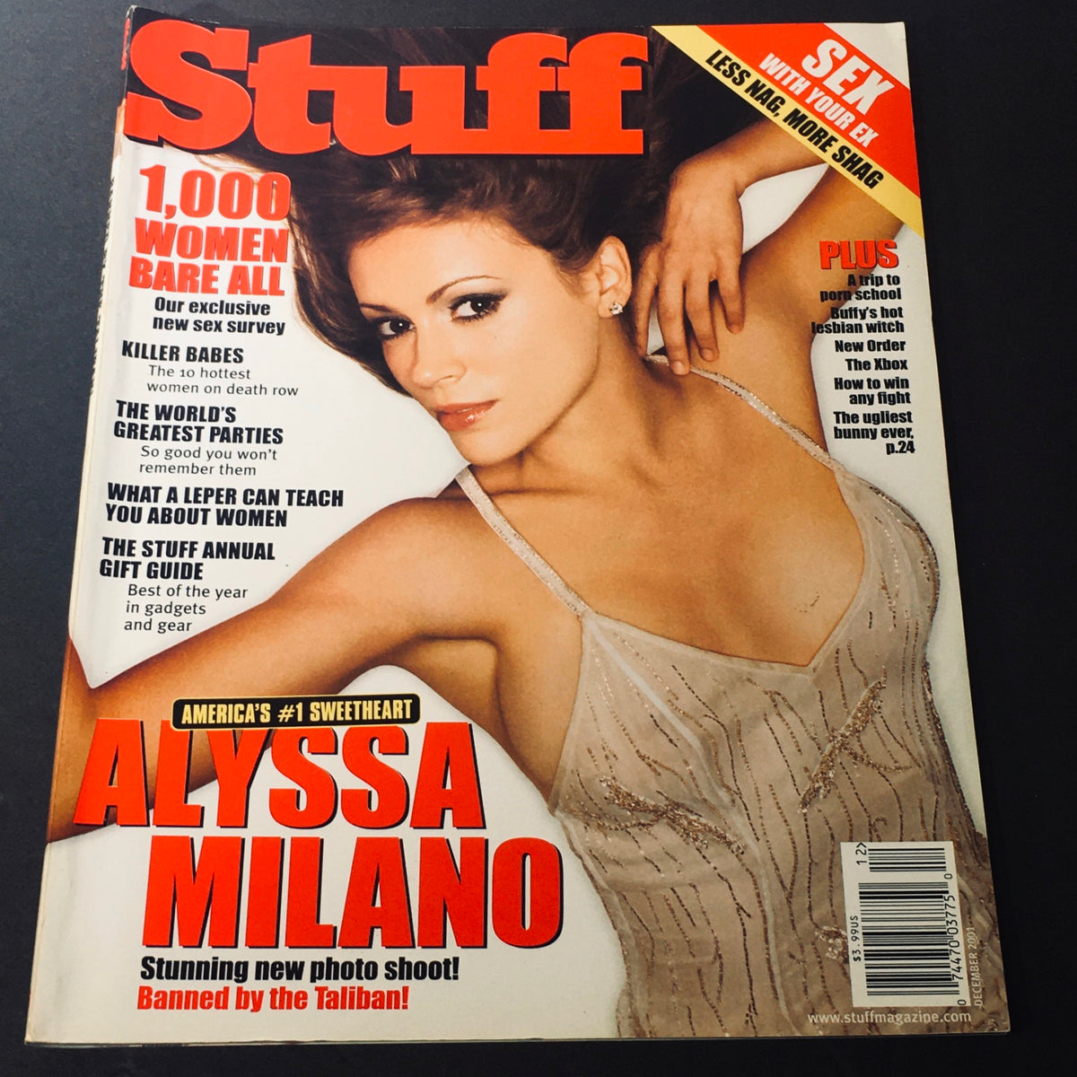 Cover of Stuff For Men Magazine from December 2001 featuring Alyssa Milano, known as America's #1 Sweetheart, showcasing vintage style and pop culture of the early 2000s.