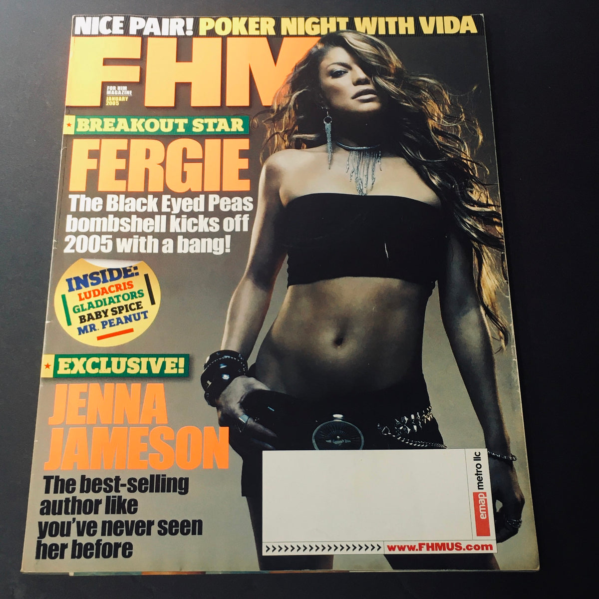 FHM Magazine January 2005 cover featuring Fergie, the breakout star from The Black Eyed Peas, and Jenna Jameson, the best-selling author, highlighting exclusive content and a stylish magazine design.