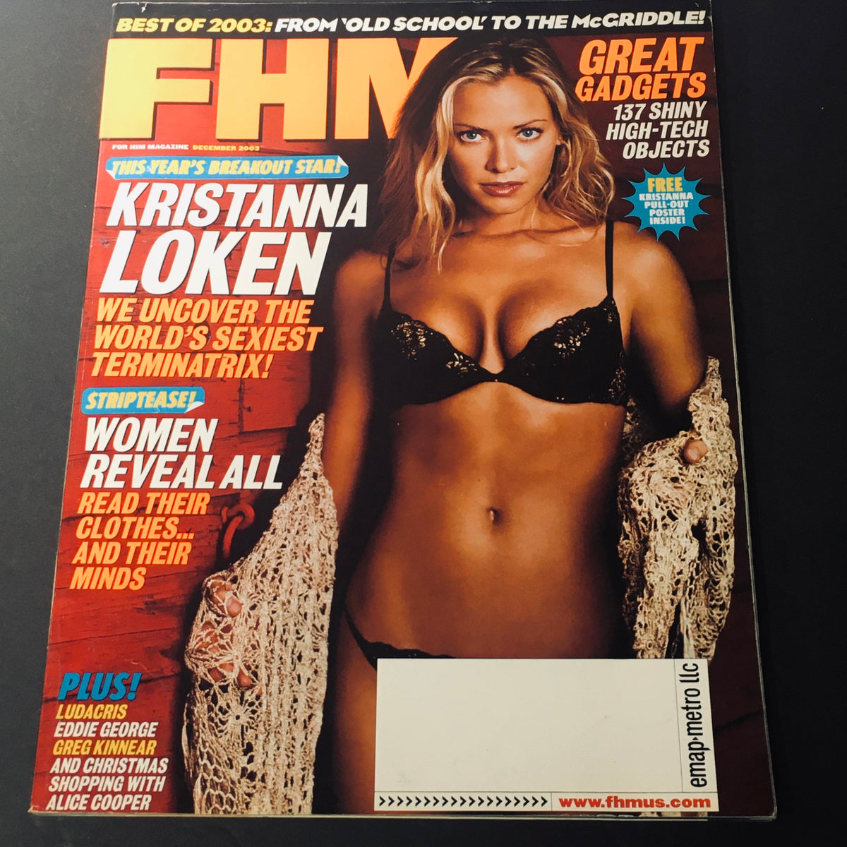 Cover of FHM Magazine December 2003 featuring Kristanna Loken as the World's Sexiest Terminatrix, showcasing her in a black bikini and knit wrap.