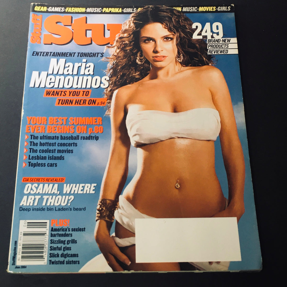 Cover of Stuff For Him Magazine from June 2004 featuring Maria Menounos. The magazine highlights entertainment and lifestyle topics, with a focus on summer themes and celebrity culture. It includes the title 'Stuff For Him Magazine June 2004 - Maria Menounos / Osama Bin Laden's Beard'.