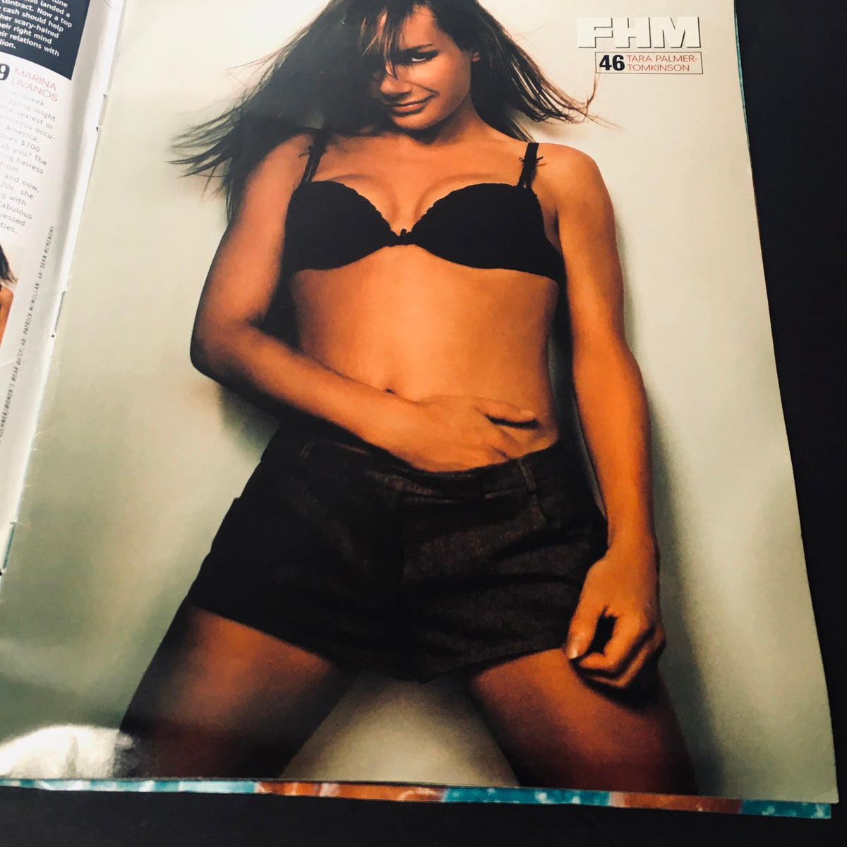 Interior page of FHM Magazine May 2001 showcasing Tara Palmer-Tomkinson in a black bra and shorts, emphasizing style and allure.