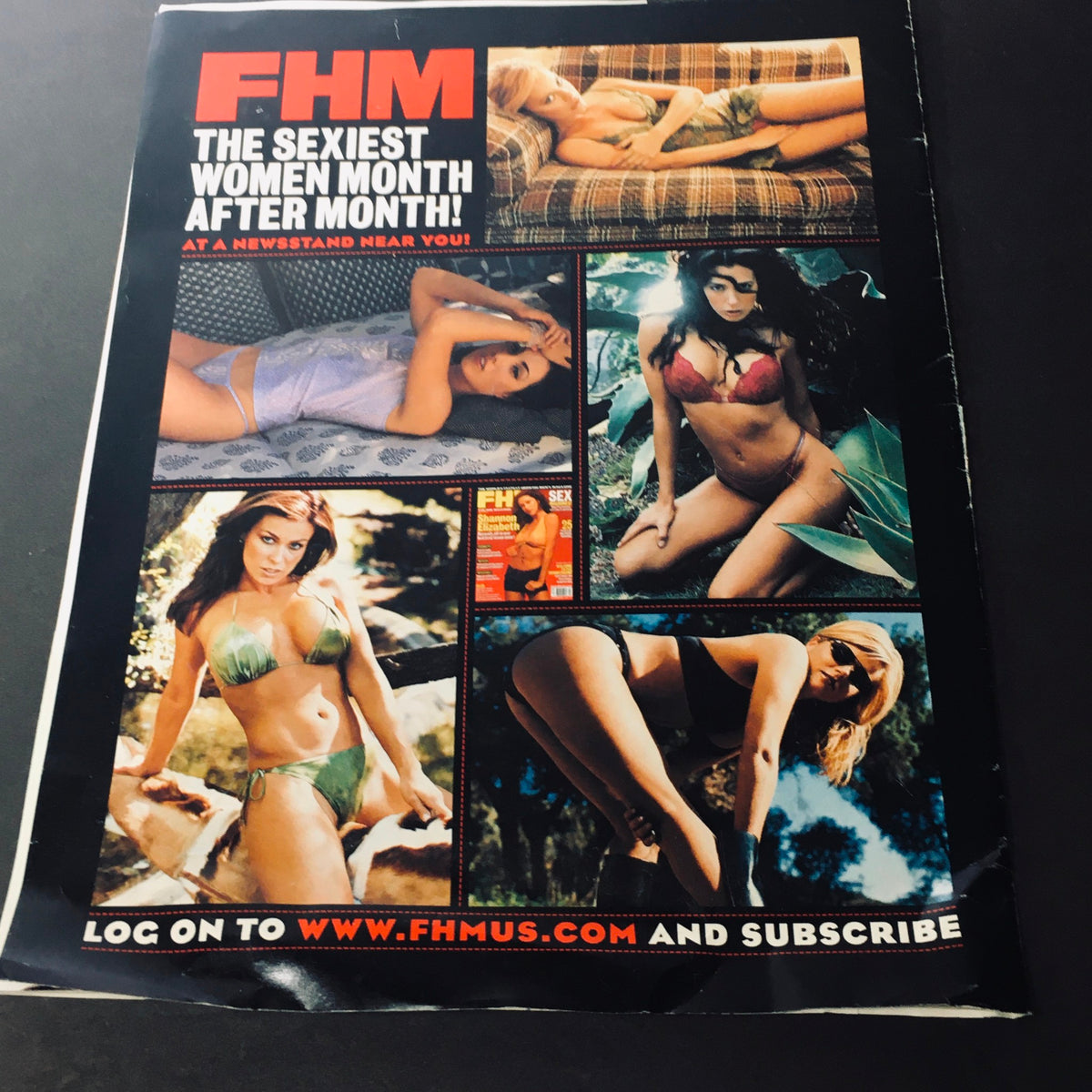Back cover of FHM Magazine May 2001 promoting subscription, featuring models in bikinis, highlighting the magazine's appeal.