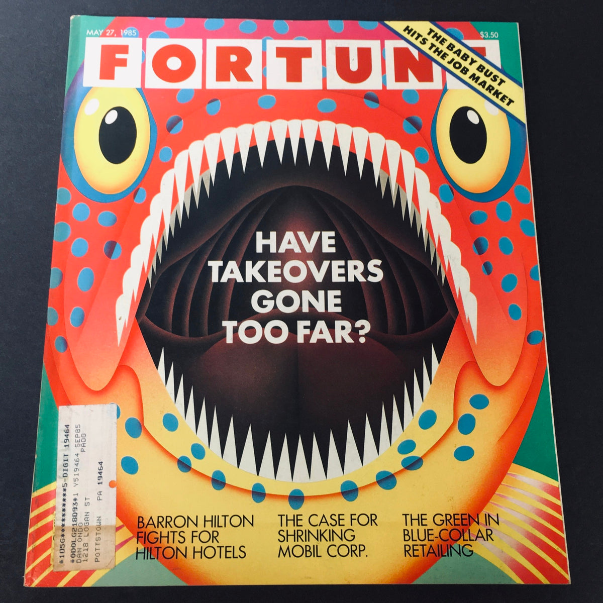 Cover of Fortune Magazine from May 27, 1985, featuring the title 'Barron Hilton Fights for Hilton Hotels' along with the question 'Have Takeovers Gone Too Far?' in bold lettering, showcasing vibrant colors and an eye-catching design.