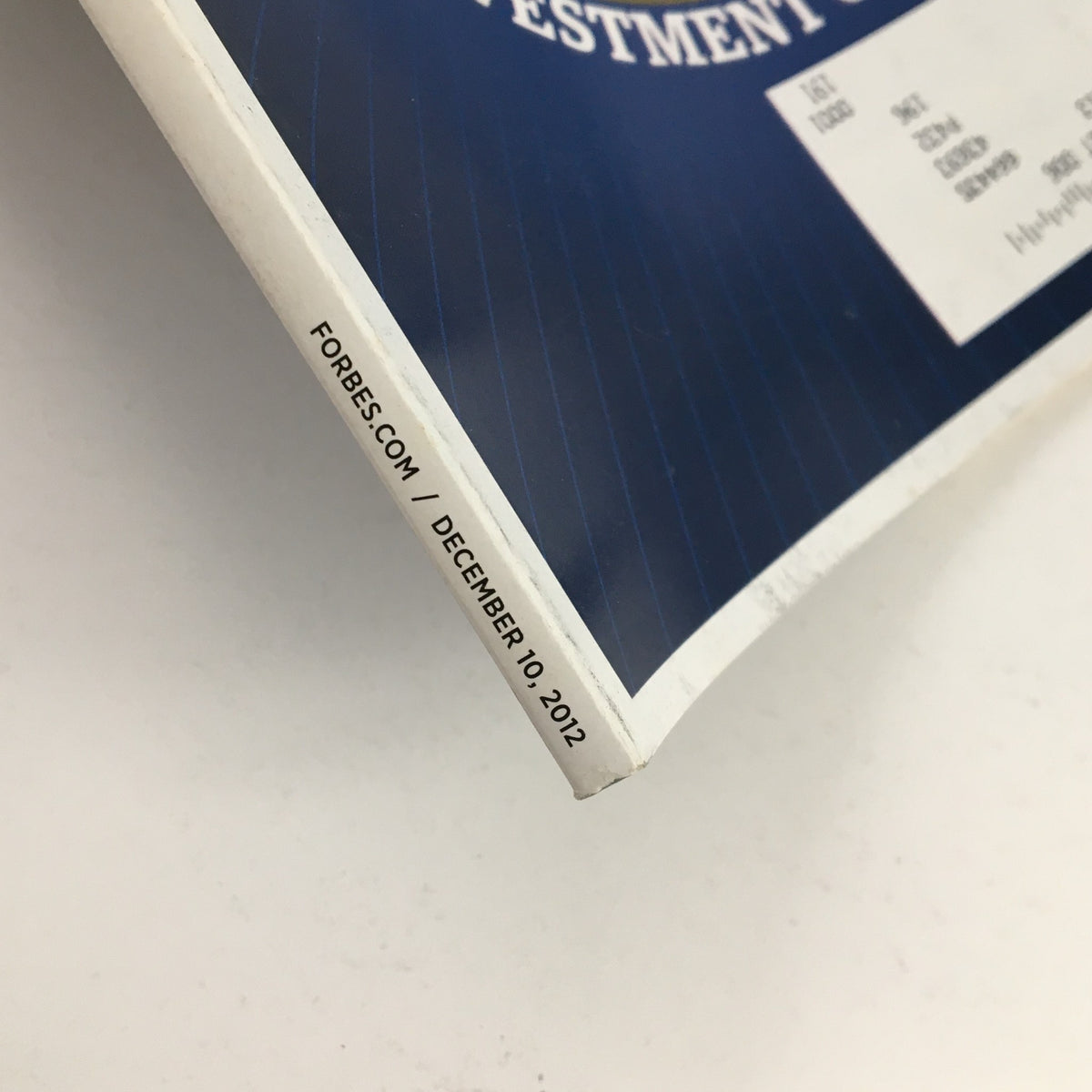 Close-up of the spine of Forbes Magazine December 10 2012 Get Rich From Barack Obama, displaying the publication date and details.