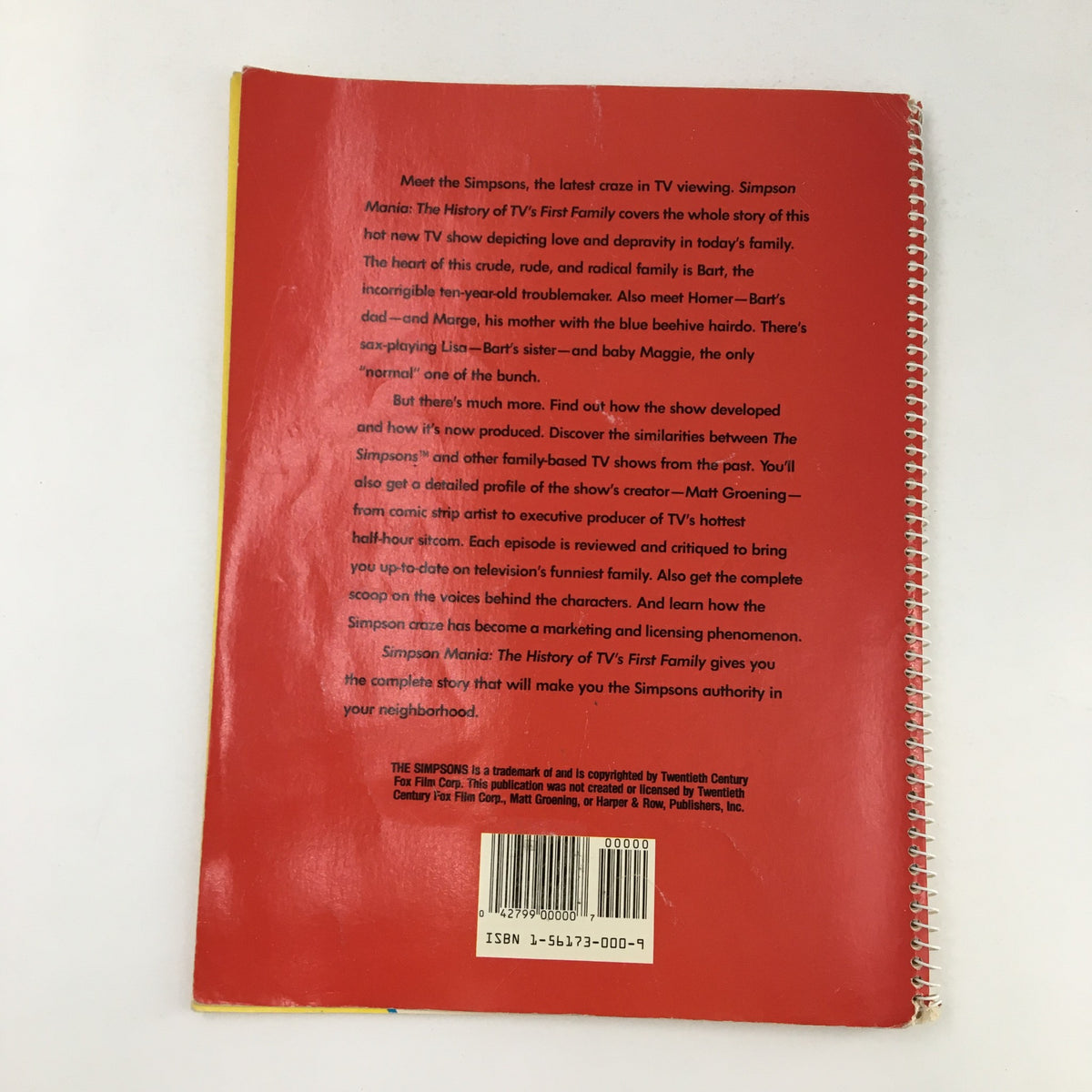 Back cover of '1990 Consumer Guide Presents Simpson Mania The History of TV's First Family,' summarizing the show's impact on television and popular culture.
