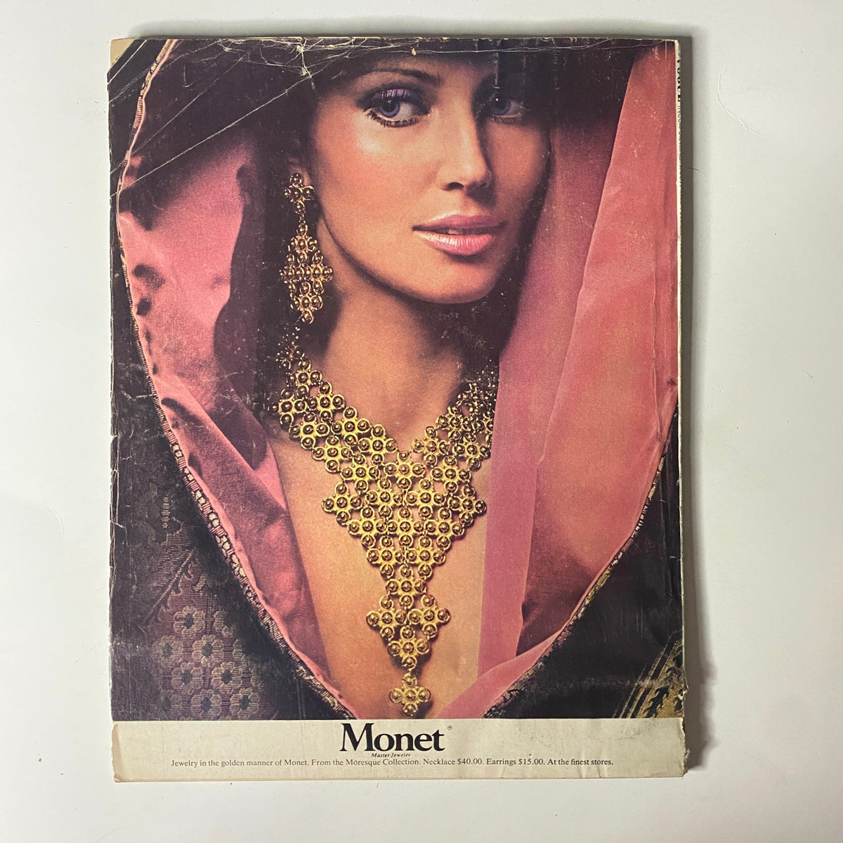 Cover of Vogue Magazine September 15, 1971 with a stunning model wearing elegant jewelry, labeled as Monet, highlighting opulent fashion trends.
