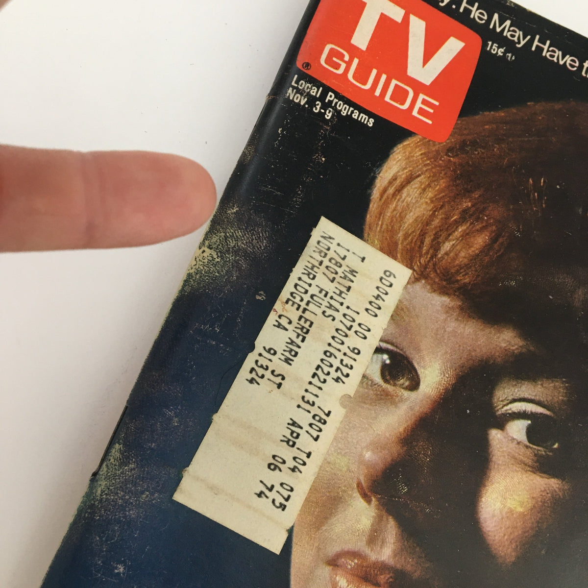 Close-up of the cover of TV Guide Magazine November 3, 1973, showing Deirdre Lenihan of 'Needles & Pins', with a finger pointing to the price tag and details on local programming.