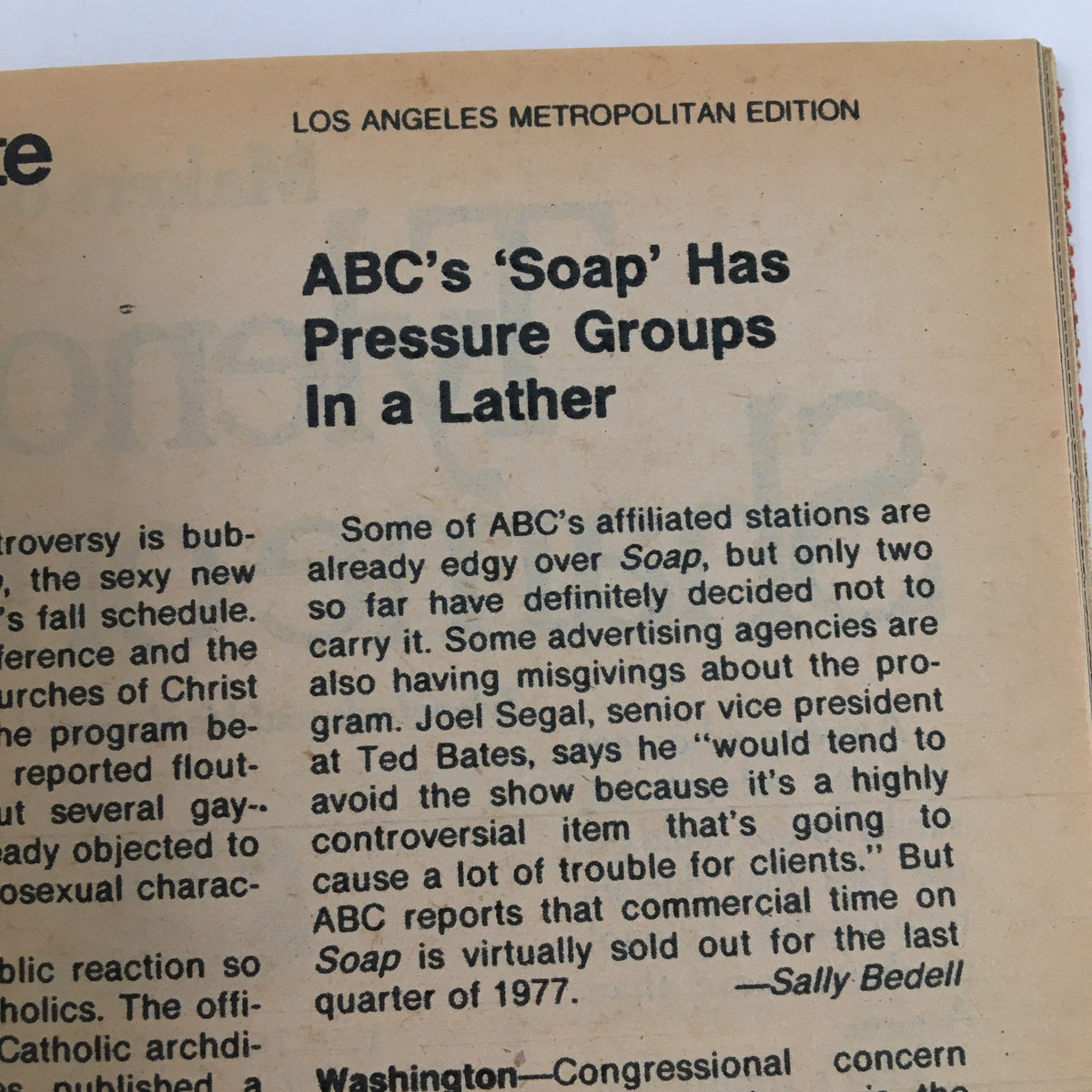 Inner content of TV Guide Magazine July 9 1977 discussing ABC's show 'Soap' and its reception among pressure groups, alongside vintage advertising.