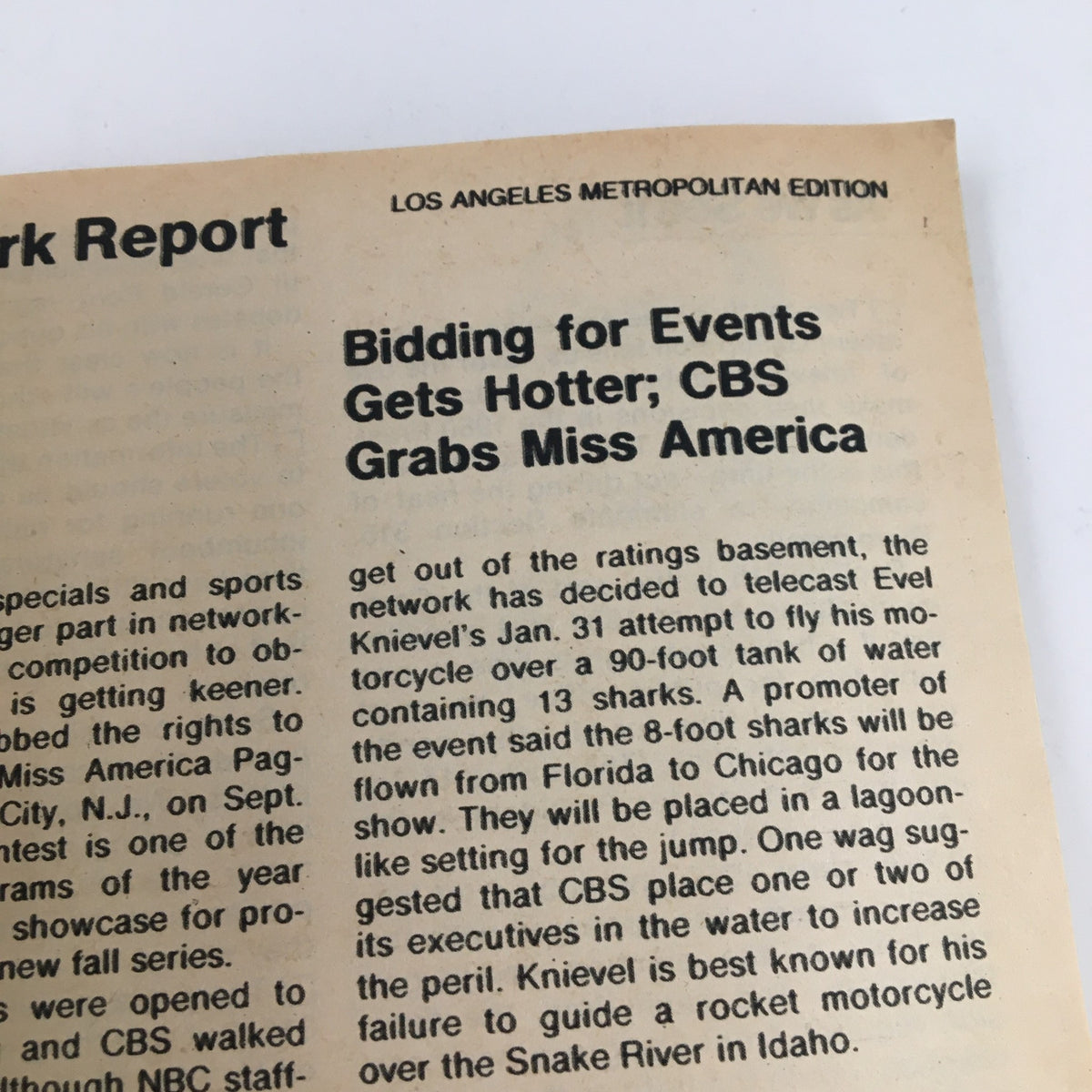 Television report page from TV Guide Magazine December 18 1976 discussing events such as Evel Knievel's motorcycle jump and the CBS acquisition of Miss America.