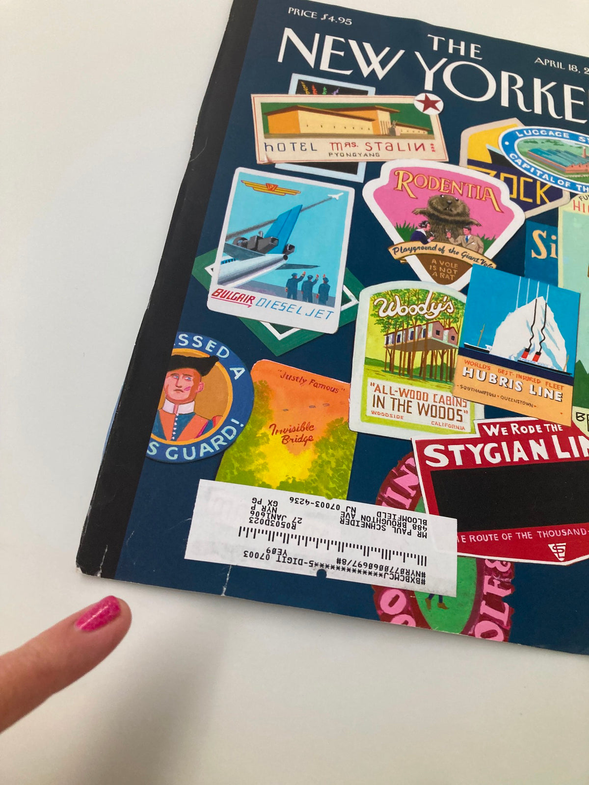 Cover of The New Yorker from April 18, 2005, titled 'The Joys of Travel' by Bruce McCall, featuring colorful travel stickers and postcards.