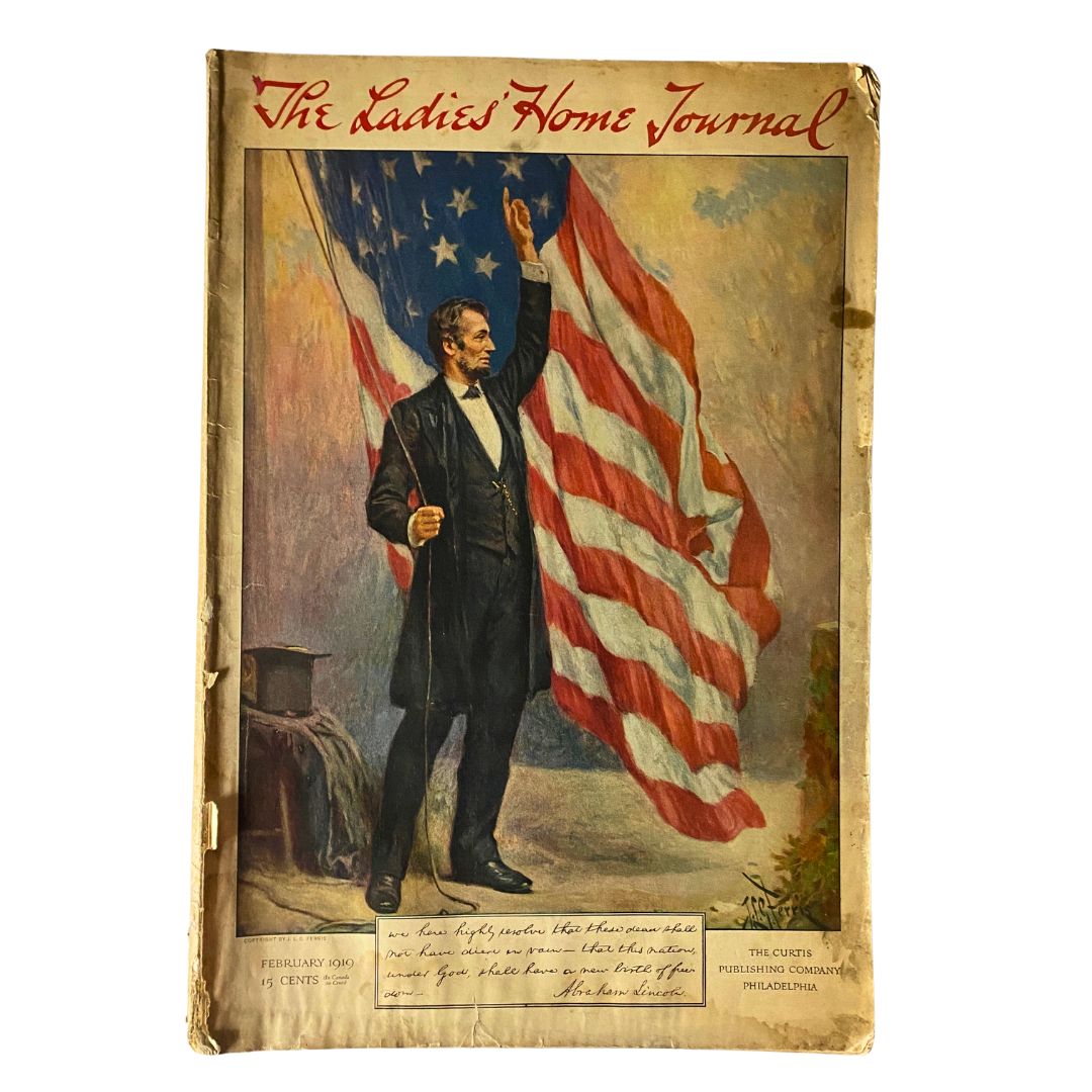 Cover of The Ladies Home Journal Magazine, February 1919, featuring Abraham Lincoln standing proudly in front of the American flag, showcasing vintage artwork and historical significance.
