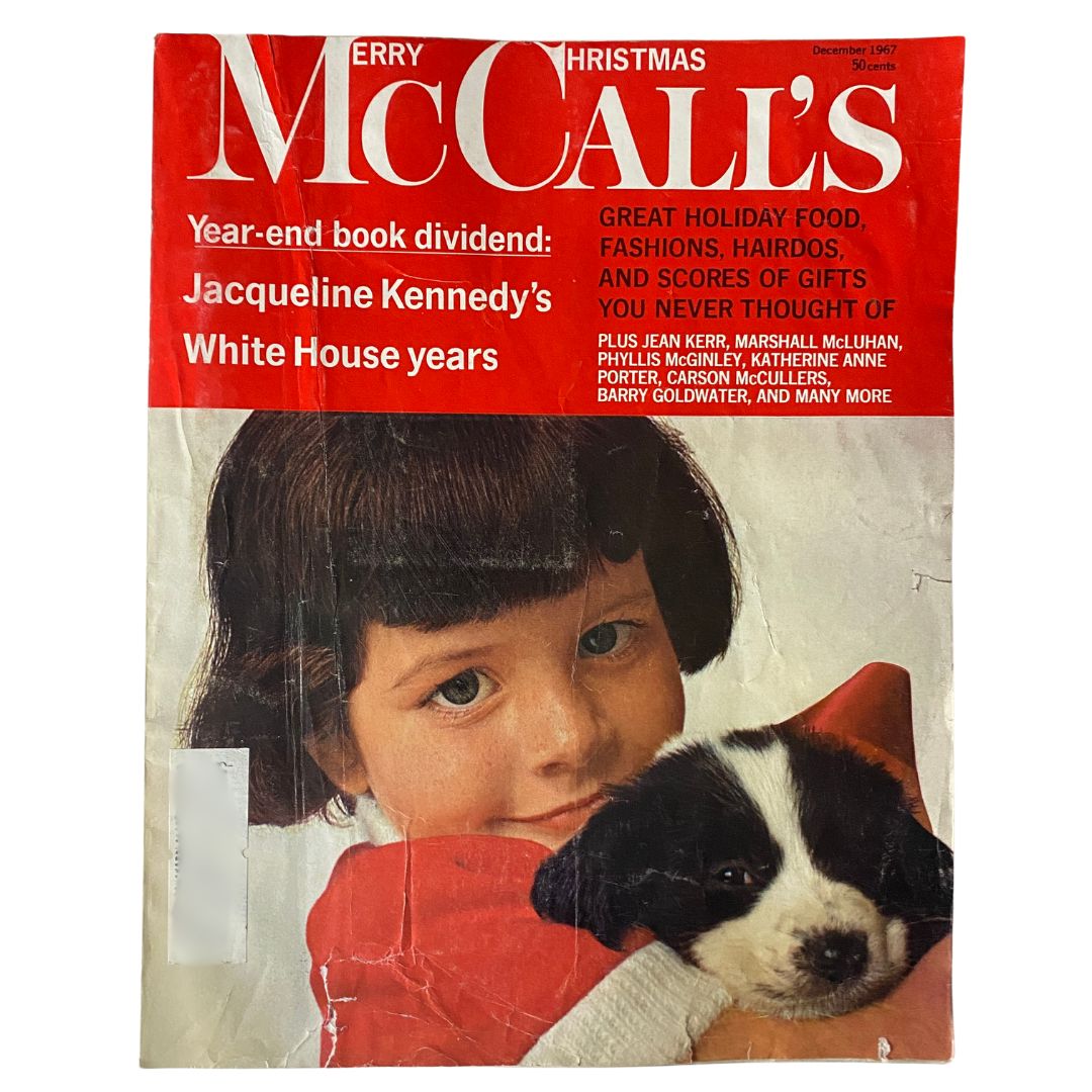 Cover of VTG McCall's Magazine December 1967 showcasing a young girl holding a puppy, with the title 'Jacqueline Kennedy's White House Years' prominently displayed.