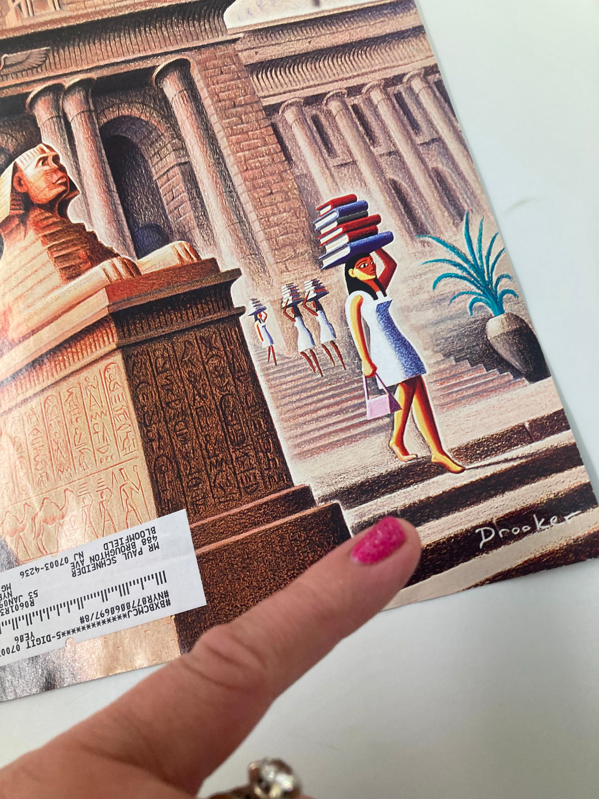 Detailed look at the bottom section of The New Yorker cover from November 7, 2005, showing the illustration 'Arcane Pleasures' by Eric Drooker and a woman walking with books.