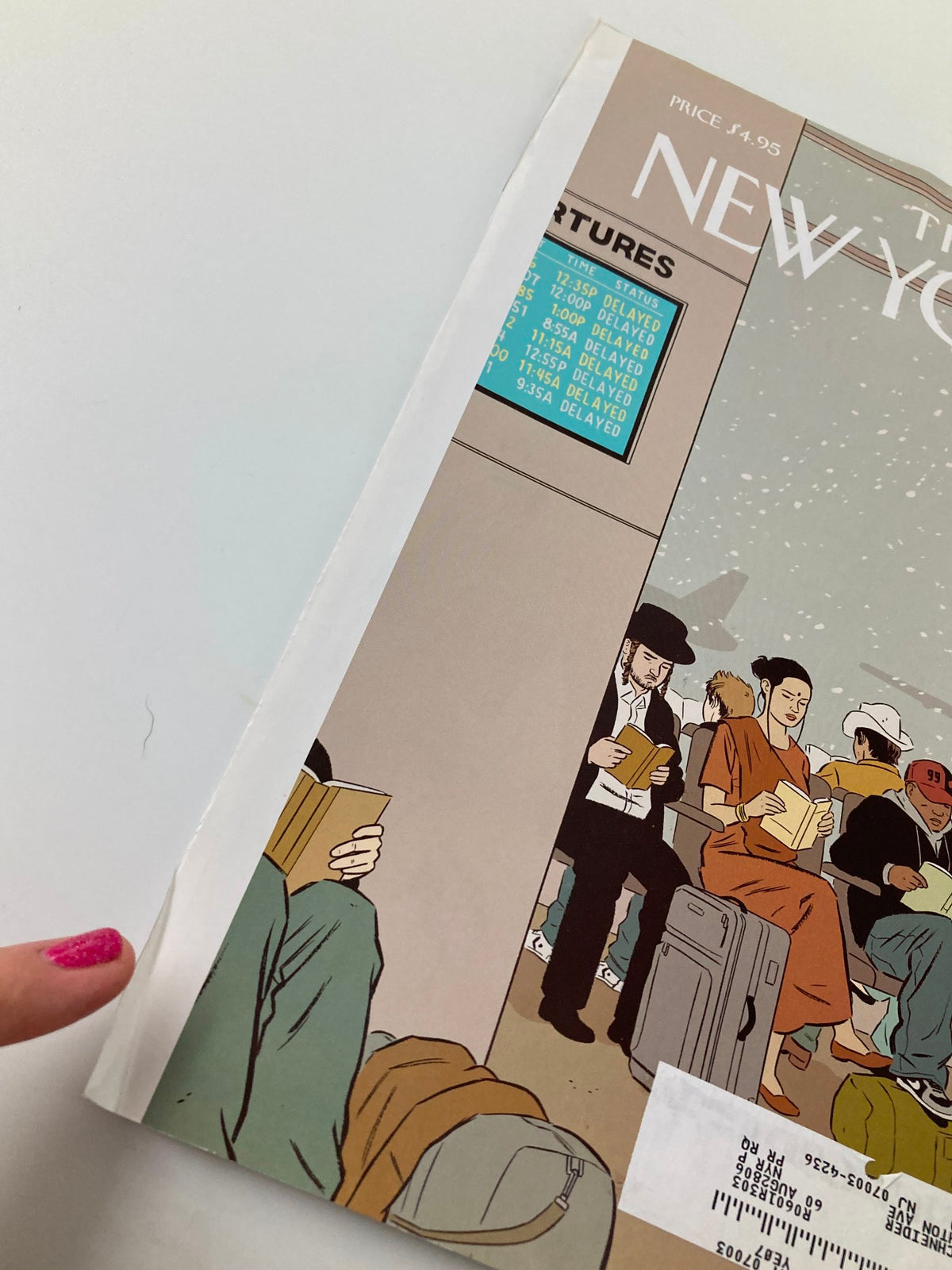 Detail of The New Yorker December 26 2005 cover showing the edge, the illustration 'Around The World' by Adrian Tomine, with airport travelers and delayed flight information.