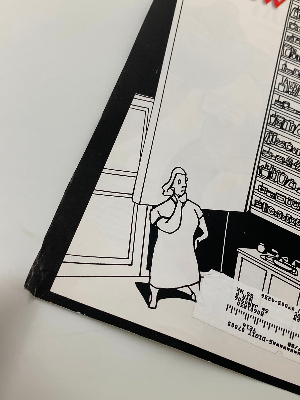 Close-up view of The New Yorker cover from November 28, 2005, titled 'Americans at Work', highlighting an illustration by Bruce E. Kaplan of a character standing in a kitchen.