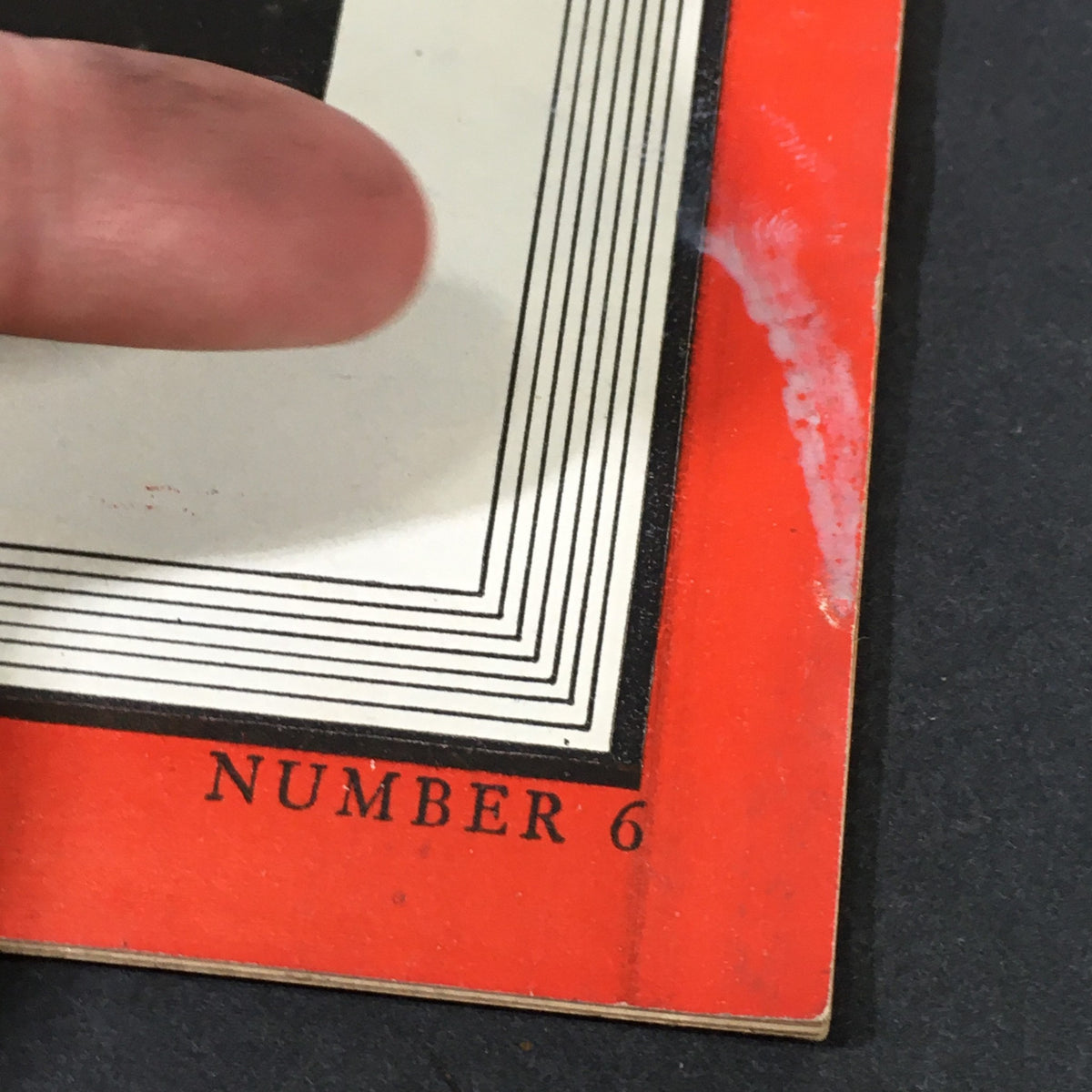 Close-up of the edge of VTG Time Magazine February 5 1945 showing wear and the issue number 6, highlighting its vintage condition.