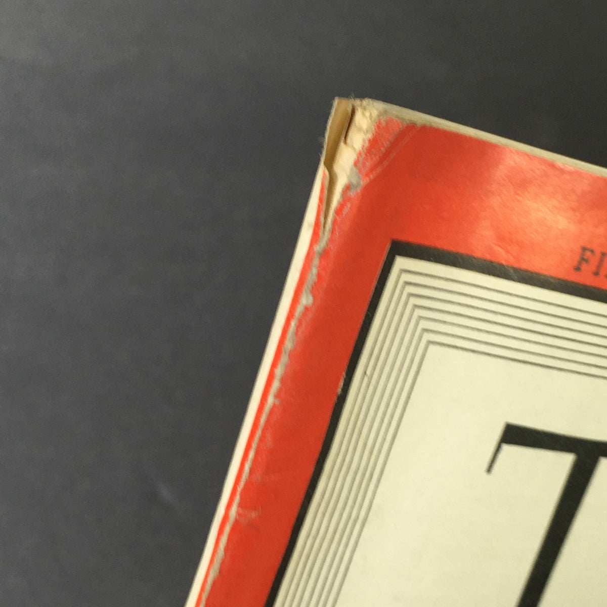 Close-up view of the corner of VTG Time Magazine Vol. 45 #14 April 2 1945, highlighting wear and imperfections that add character to this vintage collectible.