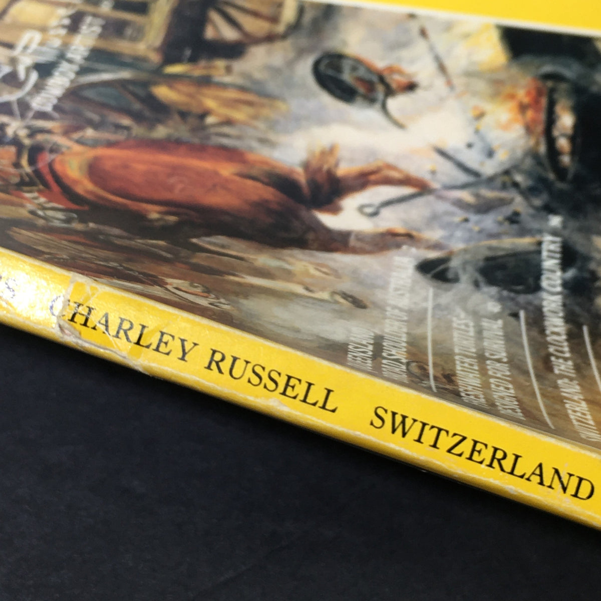 Close-up view of the spine of the January 1986 National Geographic Magazine featuring Charley Russell, Cowboy Artist.