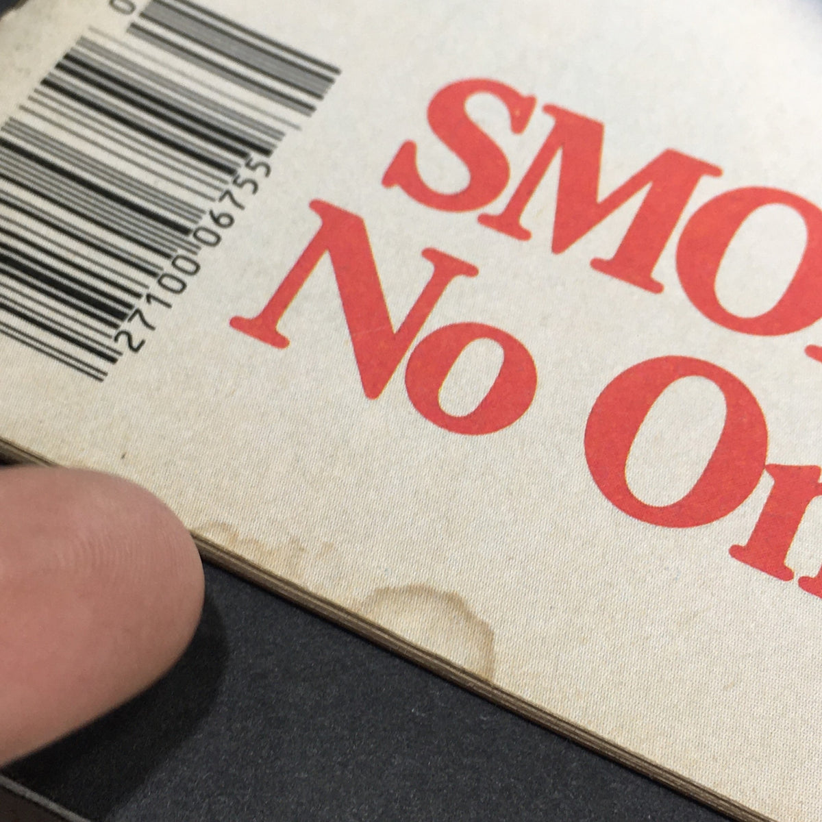 Close-up of the back cover of Mother Jones Magazine January 1979, featuring the words 'SMOKING No' along with a barcode, showcasing the vintage condition of the publication.