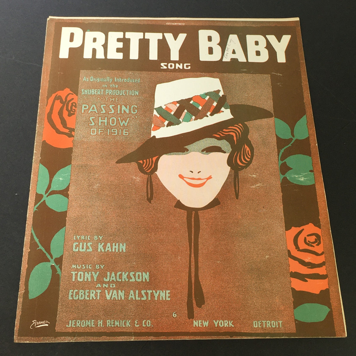 Cover of the Pretty Baby song sheet from The Passing Show of 1916, featuring vibrant artwork and vintage design, music by Tony Jackson.