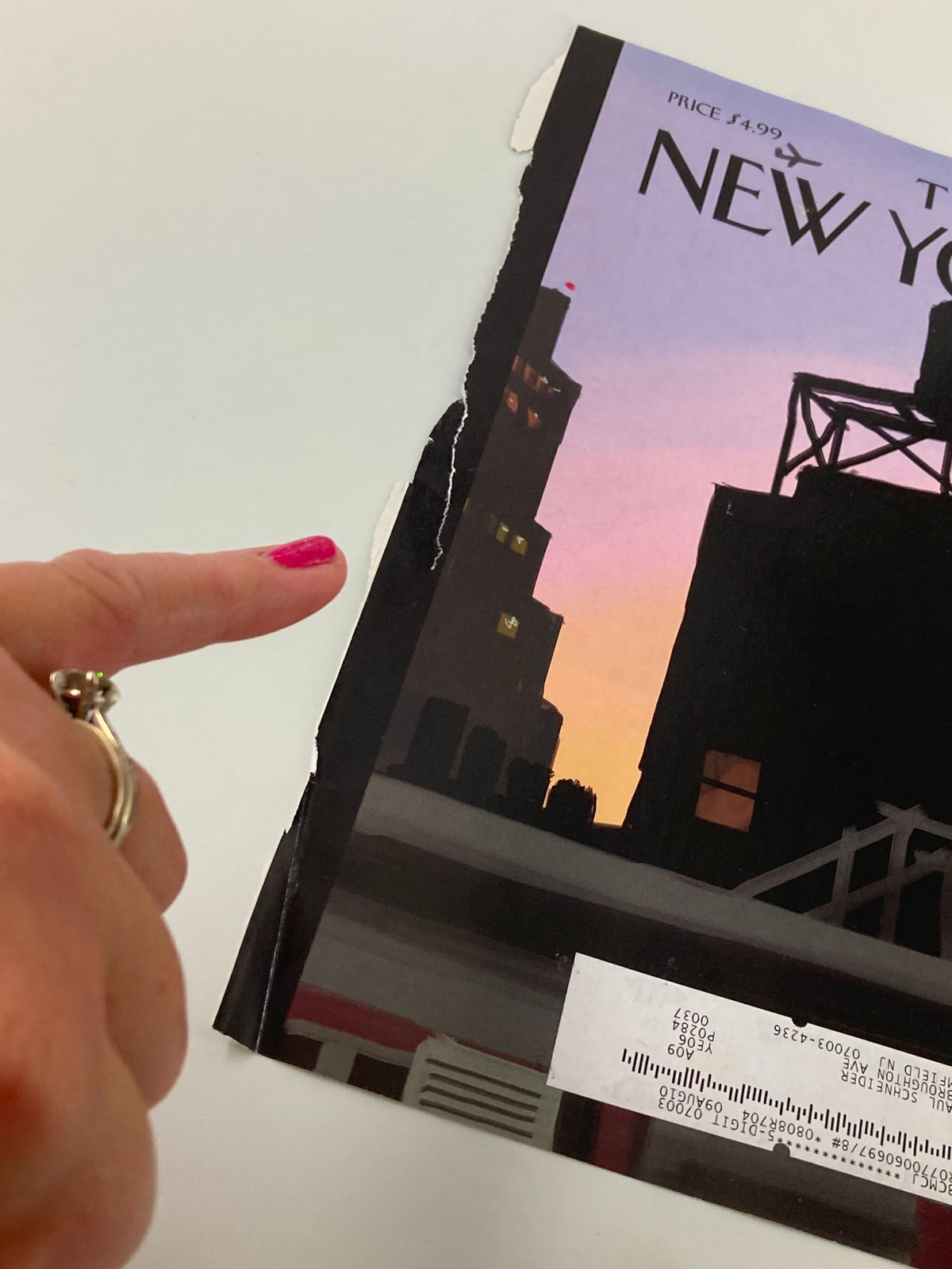 Detail view of The New Yorker September 21, 2009 cover with a focus on the edge deterioration, highlighting its character as an art piece by J. Colombo.