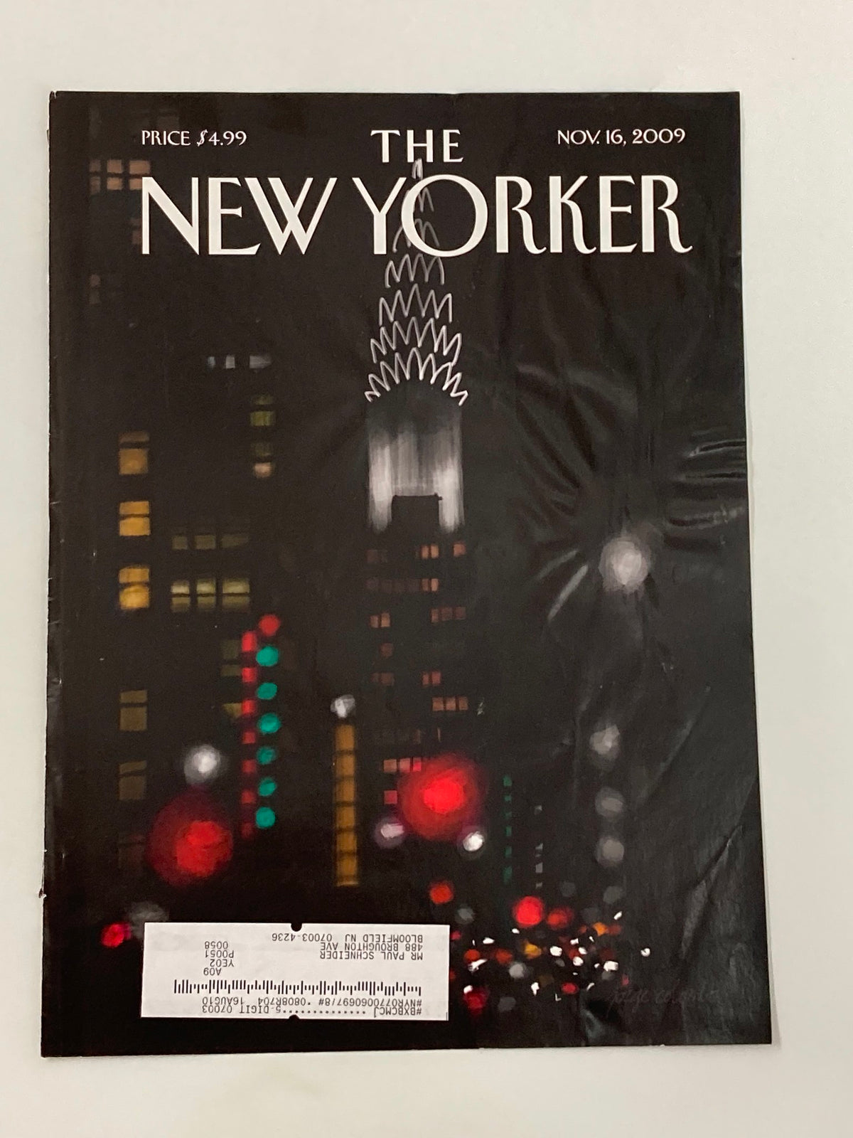Cover of The New Yorker November 16 2009 titled 'Night Lights' by Jorge Colombo, showcasing the vibrant nighttime cityscape of New York with bright lights and urban architecture.