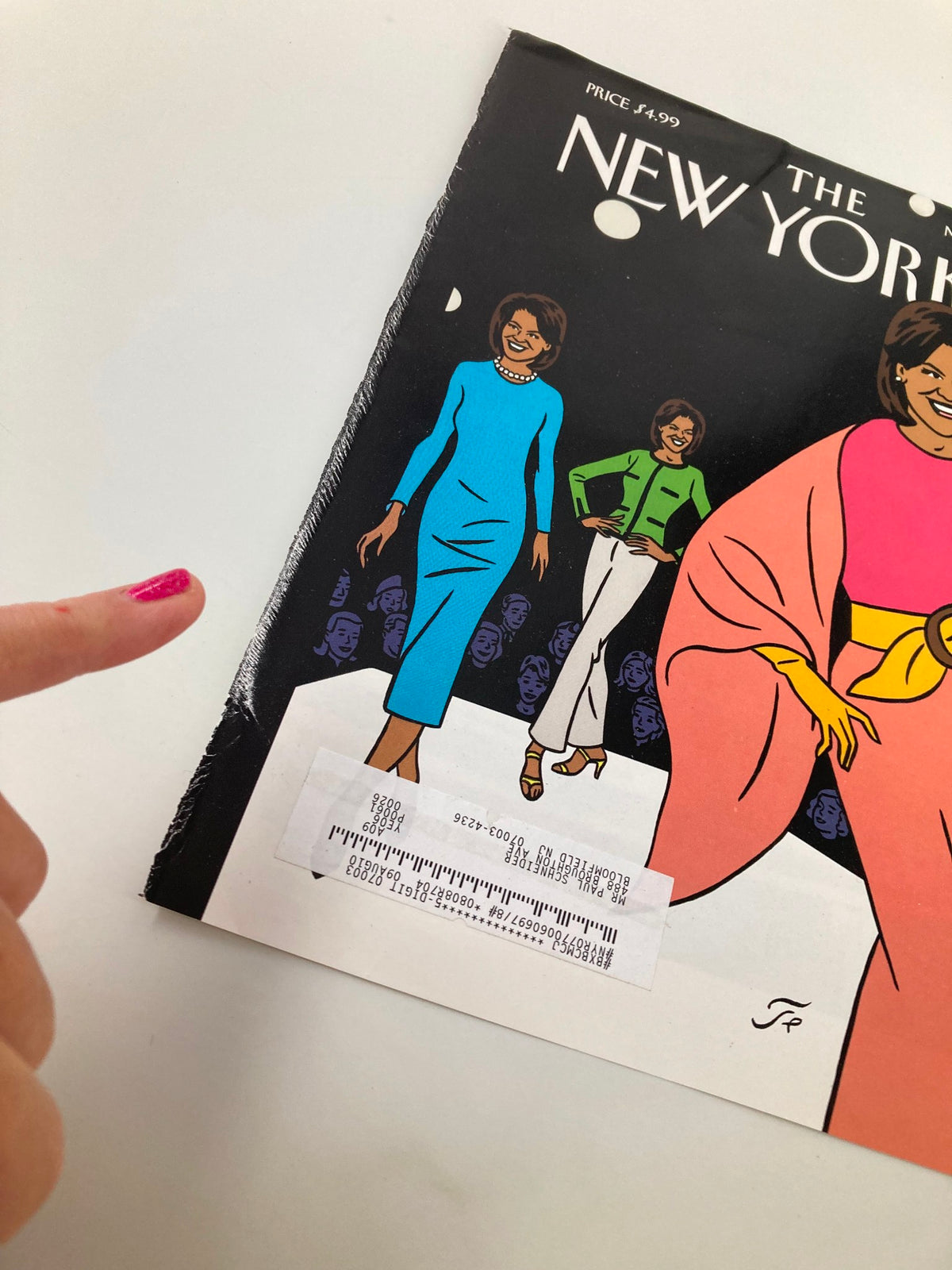 Close-up view of The New Yorker March 16 2009 cover featuring Michelle Obama illustrated by Jean-Claude Floc'h, highlighting vibrant colors and details along with a price tag on the magazine.