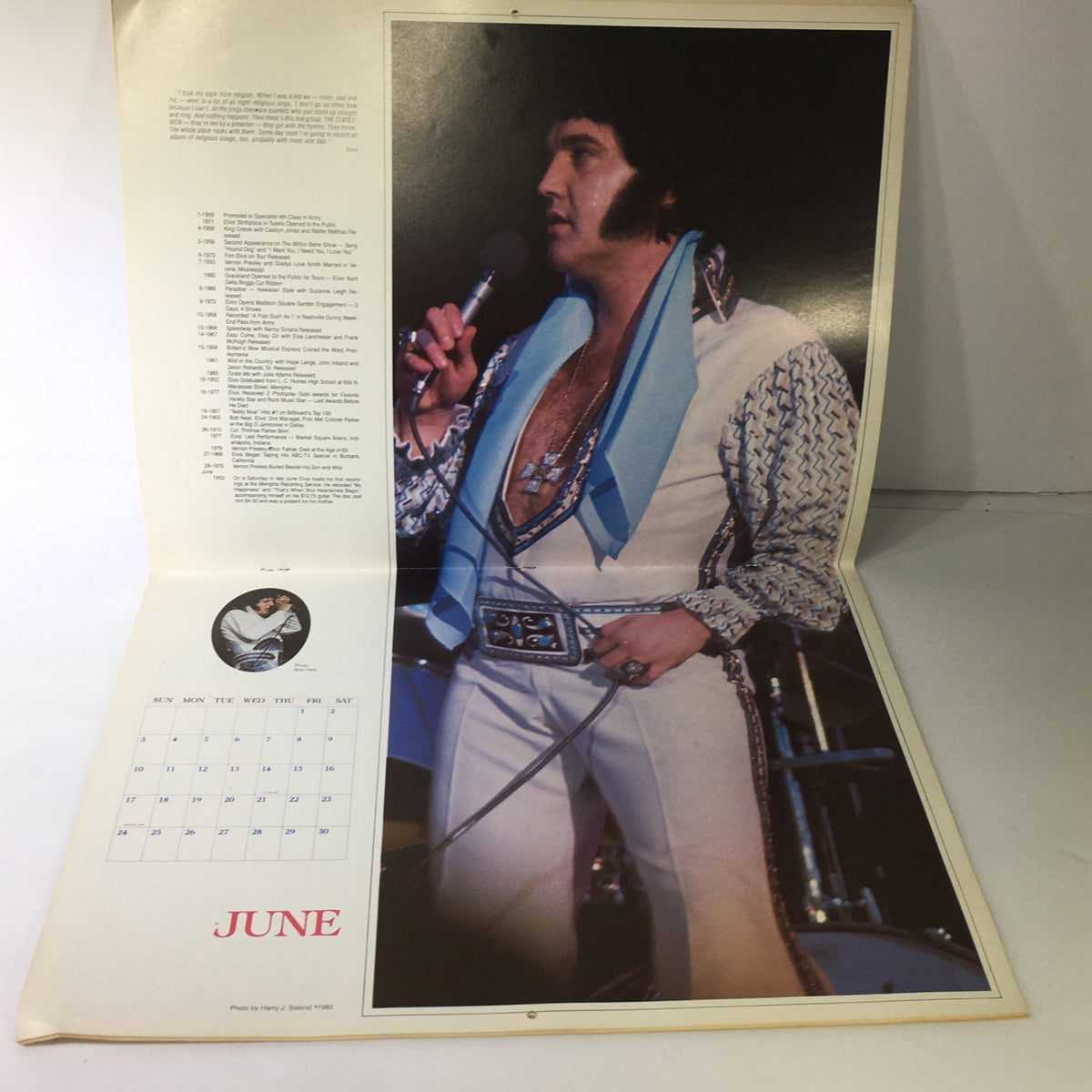 1984 Elvis Presley's Love Me Tender & Birthplace Graceland Photo Calendar, featuring a captivating photograph of Elvis Presley performing in June with a calendar layout.