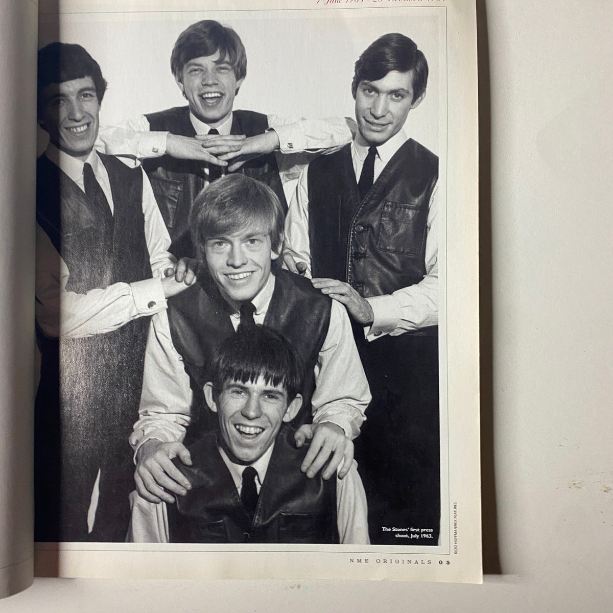 NME Originals Magazine Vol 1 Issue 9 featuring The Rolling Stones, showcasing a group photo of the band members in formal vests, reflecting their 1960s style.