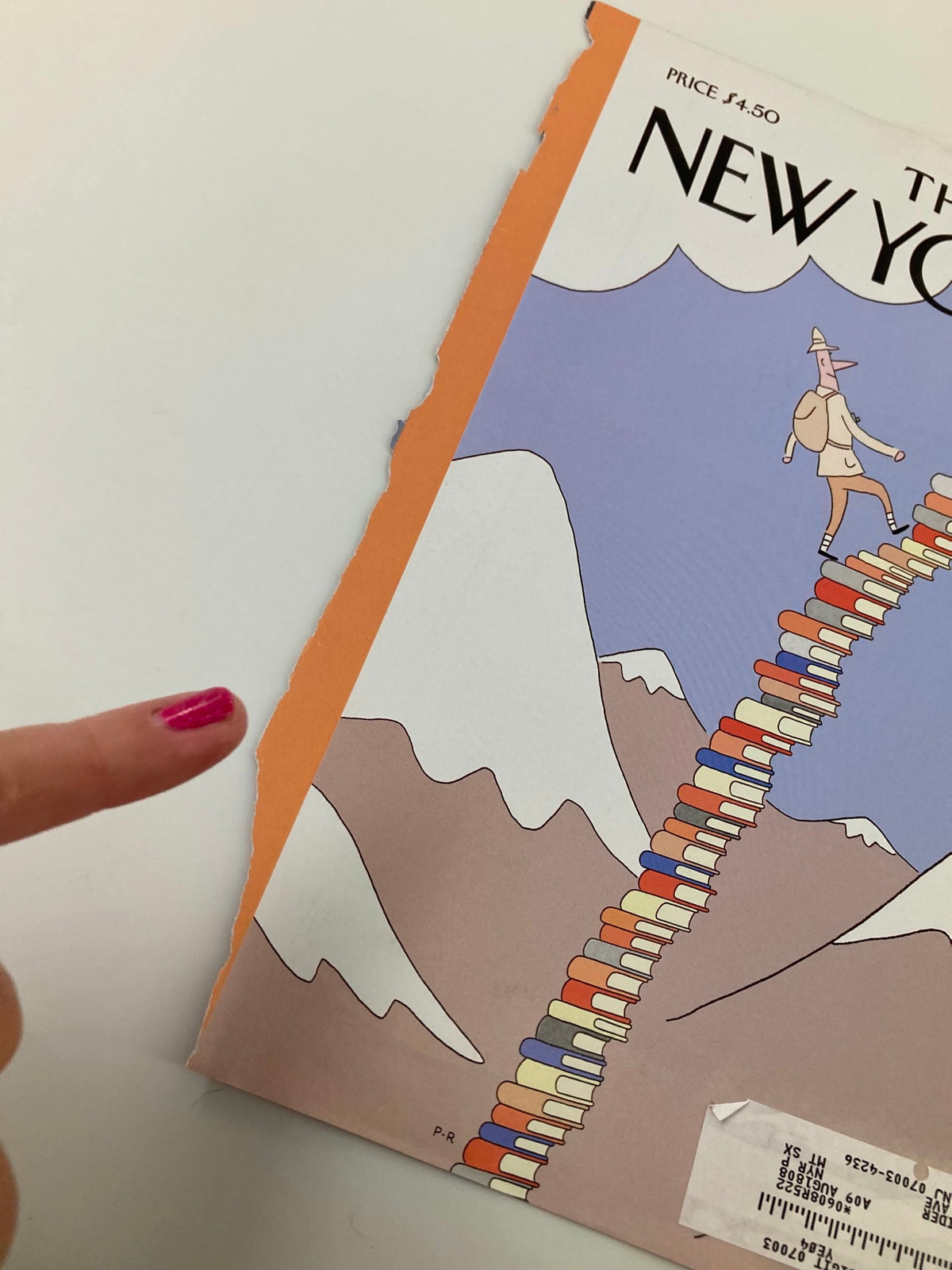Close-up detail of The New Yorker October 1, 2007 cover titled 'Stairway to the Stars' by Petit-Roulet, highlighting the torn edge and character on a stack of books.