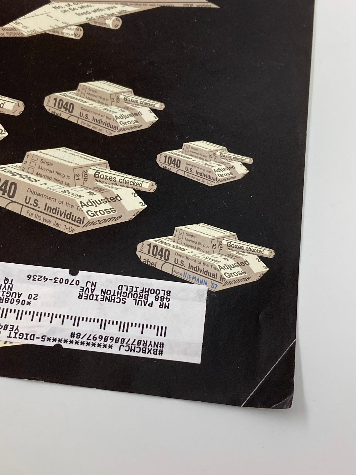 Detail of The New Yorker April 9, 2007 cover, highlighting Christoph Niemann's 'T-Day' design featuring tax-related imagery and label.