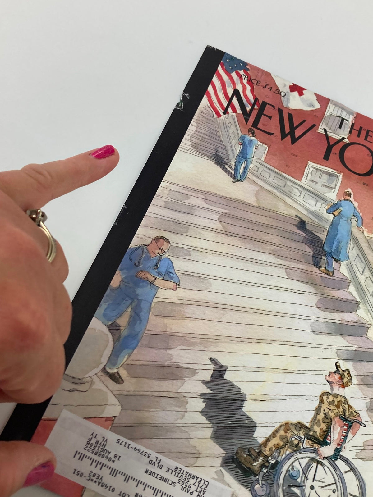 Close-up view of The New Yorker cover dated March 26, 2007, titled 'Uphill Battle' by Barry Blitt, showing details of the artwork with a hand pointing to the binding.