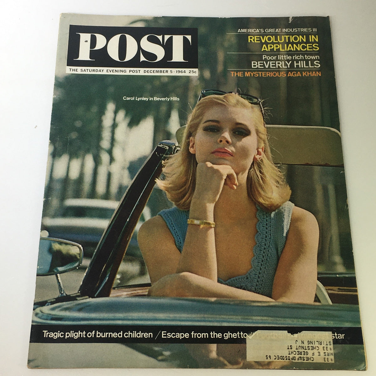 Cover of The Saturday Evening Post dated December 5, 1964, featuring Carol Lynley in Beverly Hills, showcasing vintage magazine design and cultural elements from the 1960s.