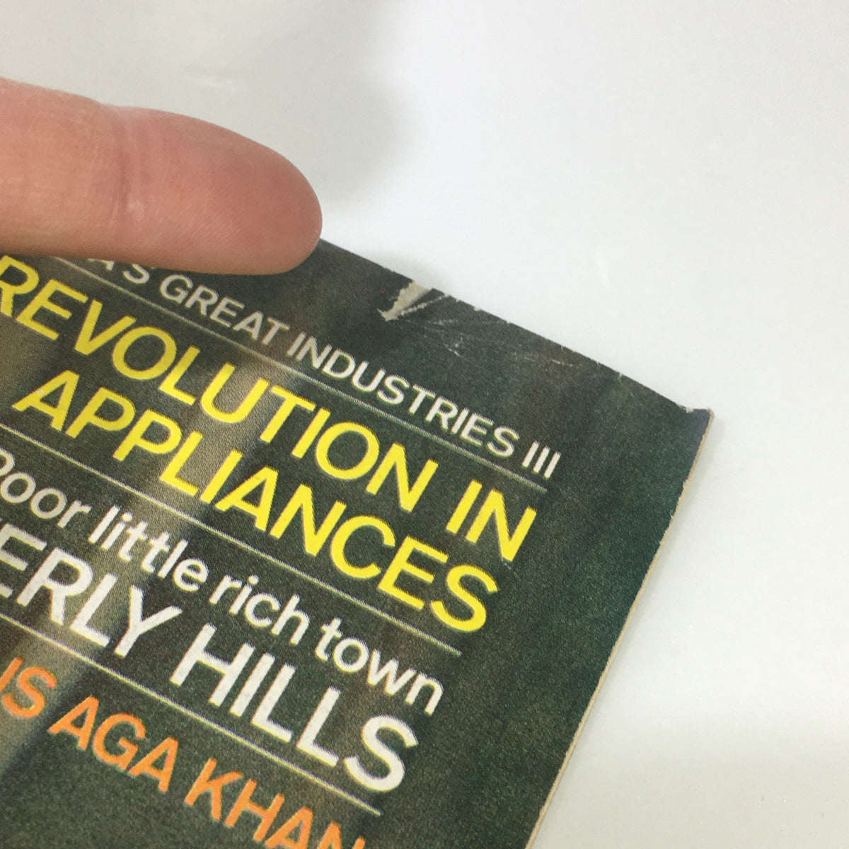 Close-up of the cover of The Saturday Evening Post December 5, 1964, featuring the text 'Revolution in Appliances' and mentioning Beverly Hills, reflecting the vintage appeal and cultural context of the 1960s.